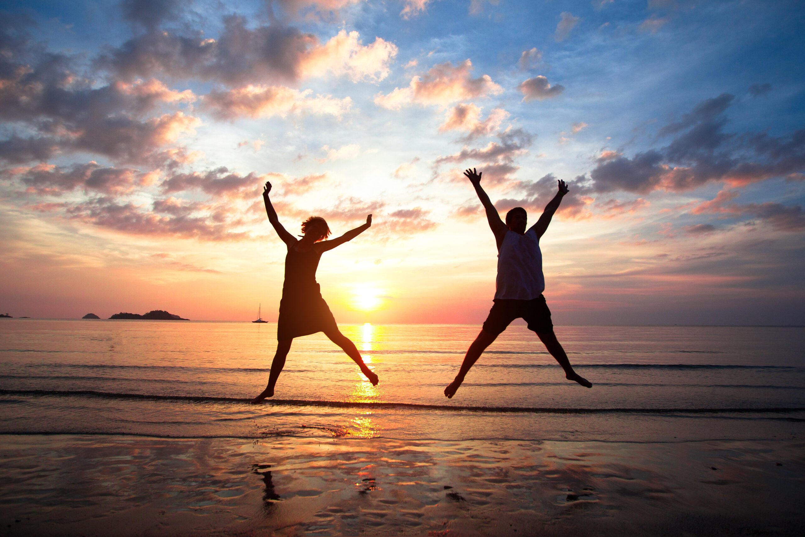 Concept,Of,Long-awaited,Vacation:,Young,Couple,In,A,Jump,On